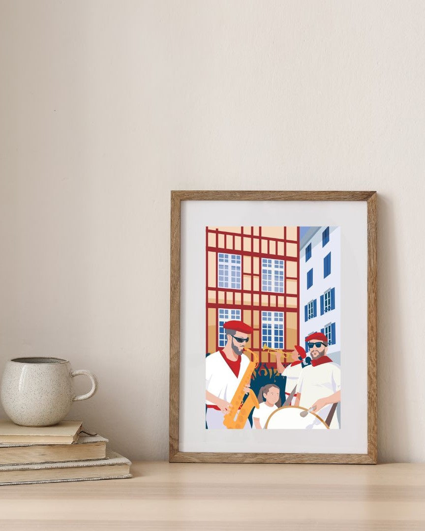 Affiche des Fêtes de Bayonne présentée dans un cadre en bois, sur un mur minimaliste.
